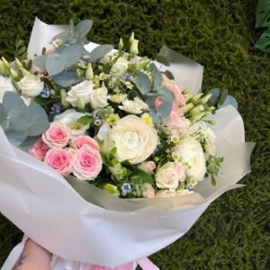 Blush and ivory bouquet with pink roses, white seasonal flowers and eucalyptus
