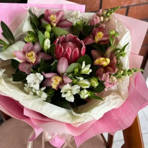 pink protea & orchid bouquet