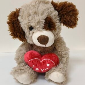 Brown plush puppy holding a red love heart