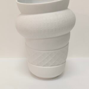 Large white porcelain statement vase with embossed geometric textures