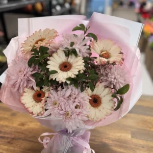 Blush Daisy bouquet with cream gerberas and pale pink chrysanthemums, handcrafted by Camellia & Co Auckland