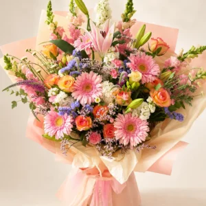 Large pink garden bouquet with lilies, gerberas, roses and seasonal flowers