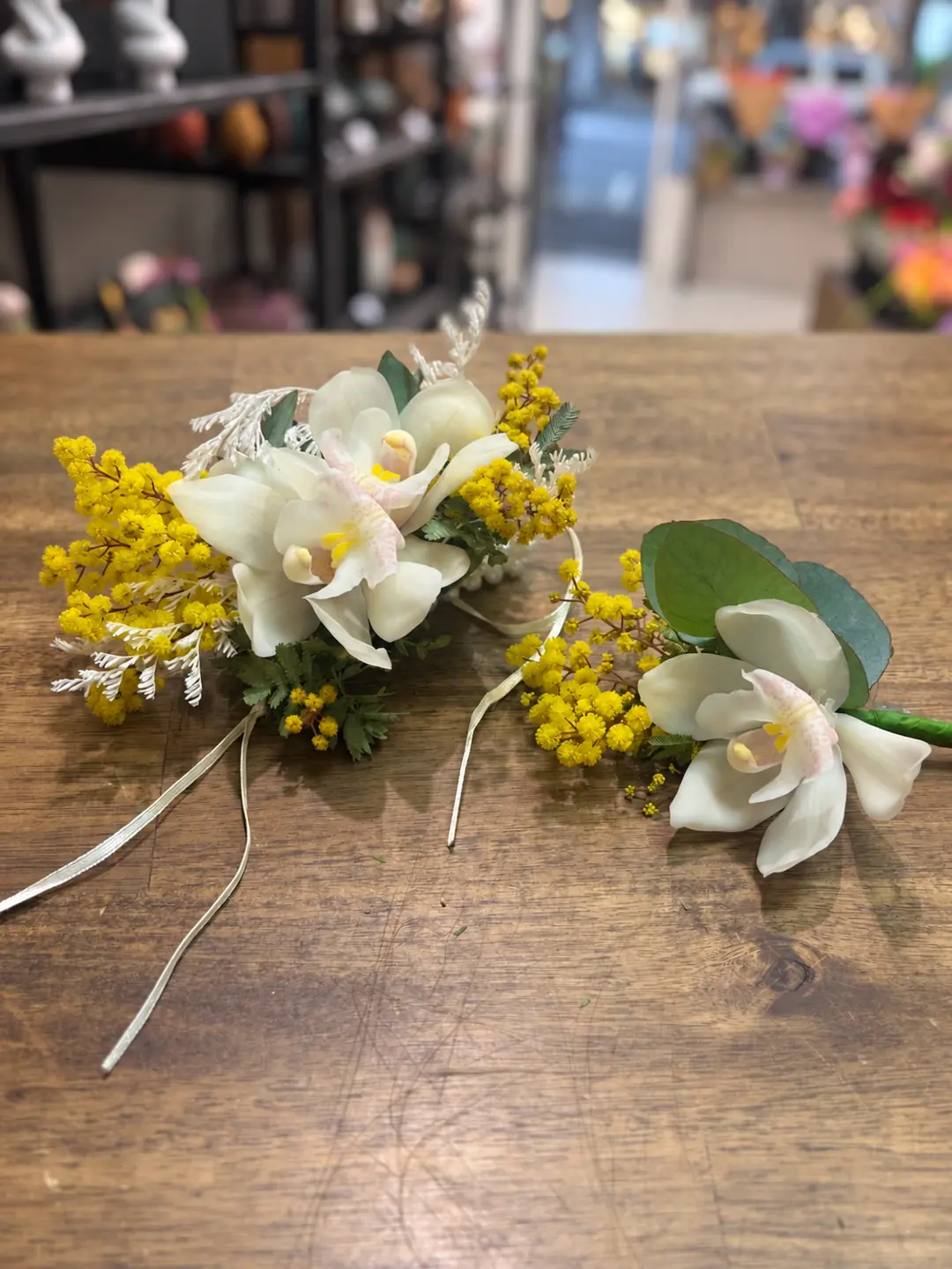 White & Yellow wrist corsage and matching boutonniere set by Camellia & Co Auckland